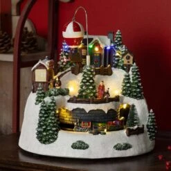 Animated Christmas Village With Train, Hot Air Balloon And LED -Northlight Shop alpine corporation christmas centerpieces wcc220hh mc 31 1000