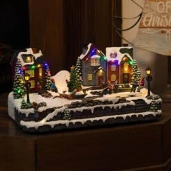 Animated Children Playing In Christmas Village With LED Light 19 Animated Children Playing In Christmas Village With LED Light -Northlight Shop alpine corporation christmas centerpieces wcc226mc 31 1000