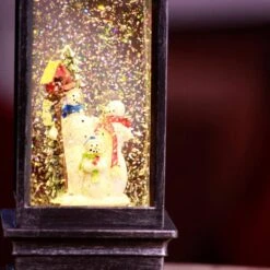 11 In. Tall Snowman Lantern Snow Globe With Warm White LED Light, Silver -Northlight Shop alpine corporation christmas novelty lights qva126sl 76 1000