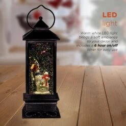 11 In. Tall Snowman Lantern Snow Globe With Warm White LED Light, Silver -Northlight Shop alpine corporation christmas novelty lights qva126sl a0 1000