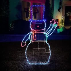 5-Ft. Prelit LED Christmas Snowman With Waving Arm Movement, Colorful Light Up Decoration -Northlight Shop fraser hill farm christmas novelty lights ffchled060 sn2 mlt 4f 1000