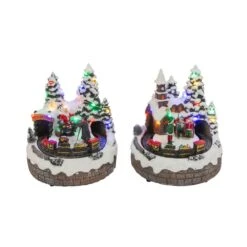 7.5 In. H B/O Lighted Christmas Musical Village With Moving Train With Timer (6/18hrs.) Uses 3 AA Batteries (Set Of 2)