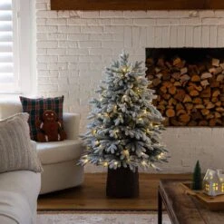 4 Ft. Pre-Lit Artificial Flocked Christmas Tree With 100-Warm White LED Lights In Decorative Trunk Planter -Northlight Shop nearly natural pre lit christmas trees t5405 31 1000