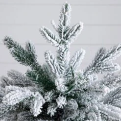 4 Ft. Pre-Lit Artificial Flocked Christmas Tree With 100-Warm White LED Lights In Decorative Trunk Planter -Northlight Shop nearly natural pre lit christmas trees t5405 44 1000