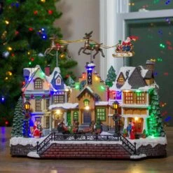 Northlight 11 In. H X 16 In. W LED Lighted And Animated Christmas Village With Flying Sleigh -Northlight Shop northlight christmas villages 34109649 31 1000