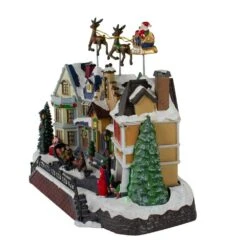 Northlight 11 In. H X 16 In. W LED Lighted And Animated Christmas Village With Flying Sleigh -Northlight Shop northlight christmas villages 34109649 4f 1000