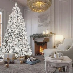 9 FT Pre-Lit Snow Flocked Hinged Artificial Christmas Tree With 850 UL Warm White Lights & 63 Natural Pine Cones -Northlight Shop pre lit christmas trees t3637p339761yf 1d 1000