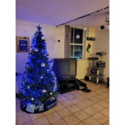 7.5 Ft. Green Hinged Unlit Artificial Christmas Tree With Metal Stand -Northlight Shop unlit christmas trees m21 8cm221 fa 1000